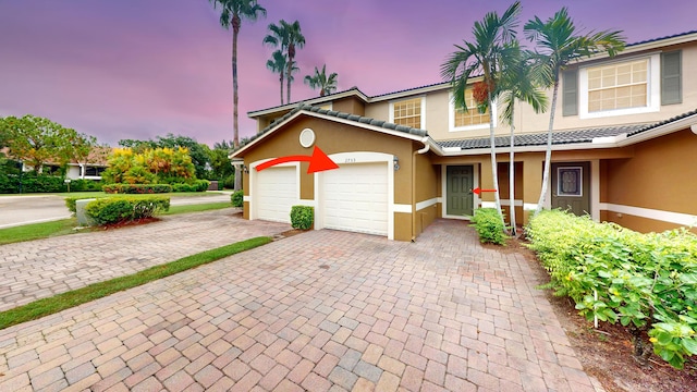 view of property featuring a garage