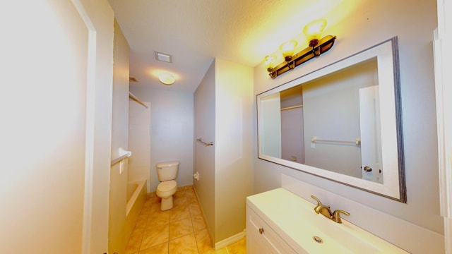 full bathroom with a textured ceiling, tile patterned flooring, vanity, toilet, and bathtub / shower combination