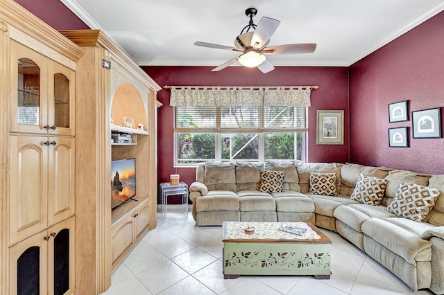 living room featuring ornamental molding, ceiling fan, and light tile patterned floors