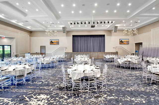 interior space featuring coffered ceiling, a high ceiling, a notable chandelier, and beam ceiling