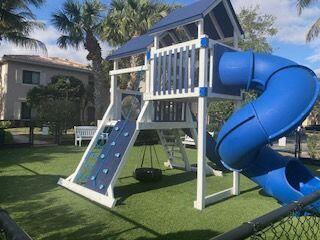 view of jungle gym featuring a yard