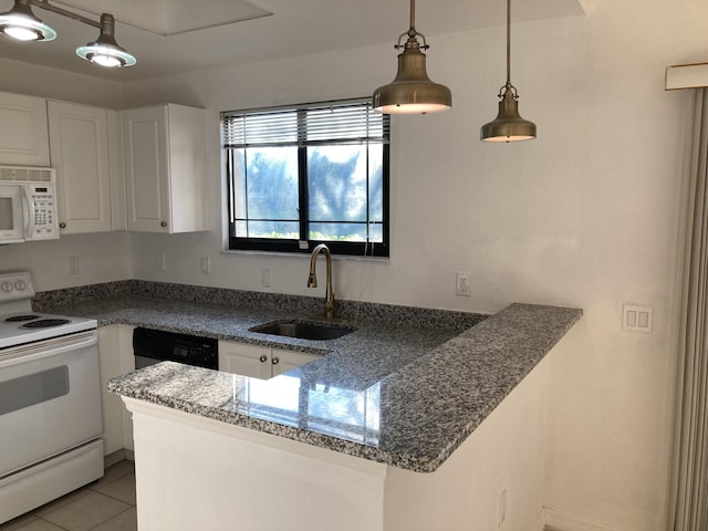 kitchen with sink, white cabinetry, white appliances, light tile patterned floors, and pendant lighting