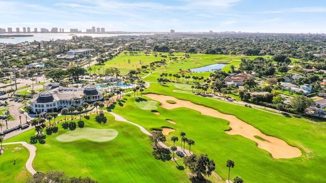 bird's eye view featuring a water view, a city view, and golf course view