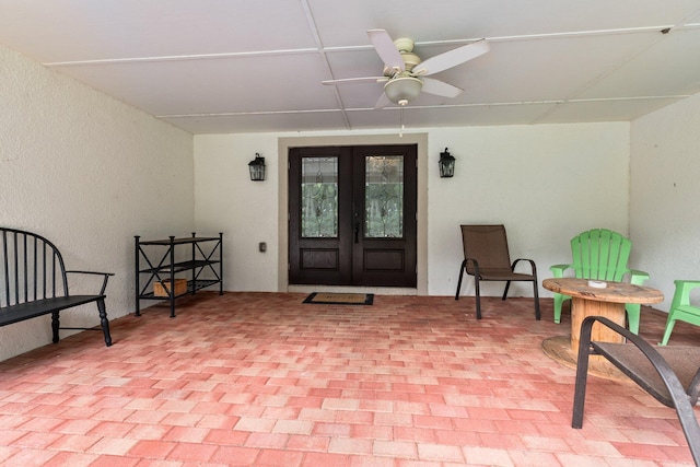 property entrance with ceiling fan and french doors