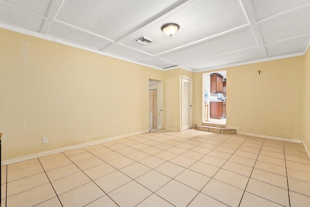 unfurnished room with light tile patterned floors