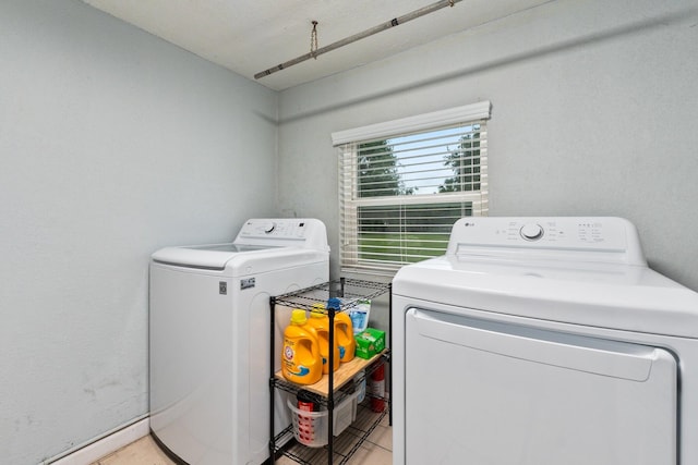 laundry area with independent washer and dryer