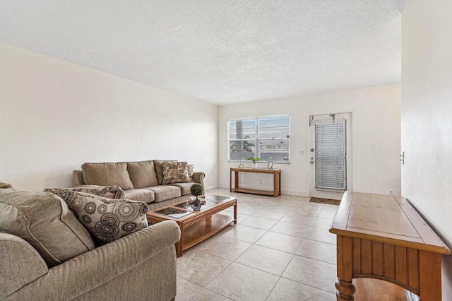 tiled living room with a textured ceiling