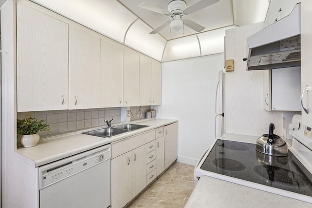 kitchen featuring backsplash, ceiling fan, white appliances, and sink