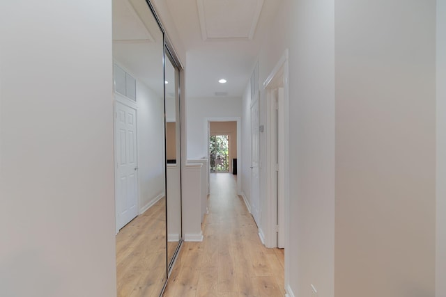 hall featuring light hardwood / wood-style floors