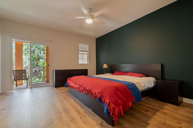 bedroom featuring access to outside, light hardwood / wood-style flooring, and ceiling fan