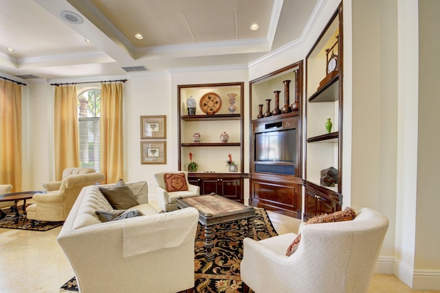 living room with built in shelves and ornamental molding