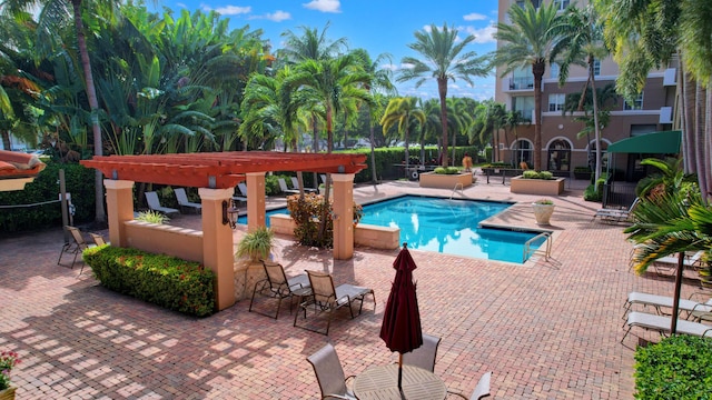 view of pool featuring a patio area and a pergola