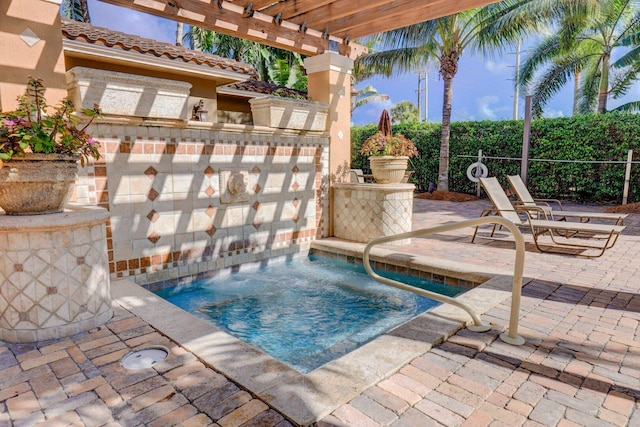 view of pool with a pergola and a patio area