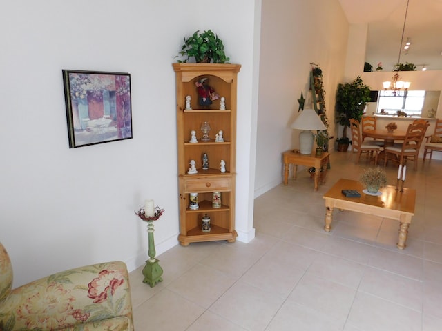 interior space featuring a chandelier and light tile patterned flooring