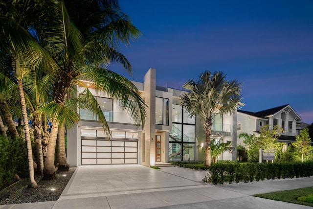 view of front of property featuring a garage