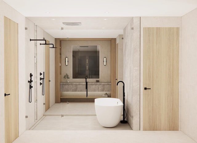 bathroom featuring a tub to relax in and tile patterned flooring