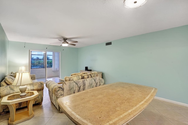 tiled bedroom featuring access to exterior and ceiling fan