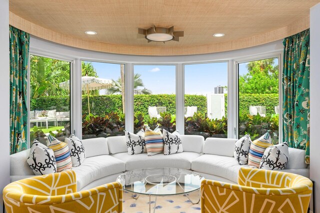 living room with light parquet floors and a fireplace