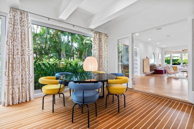 sunroom / solarium with beam ceiling