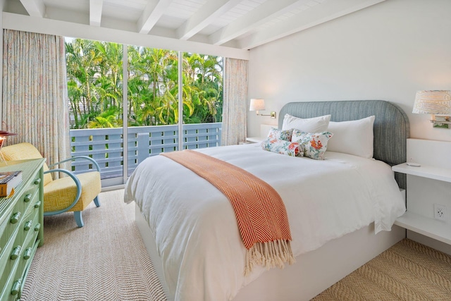 bedroom featuring beam ceiling