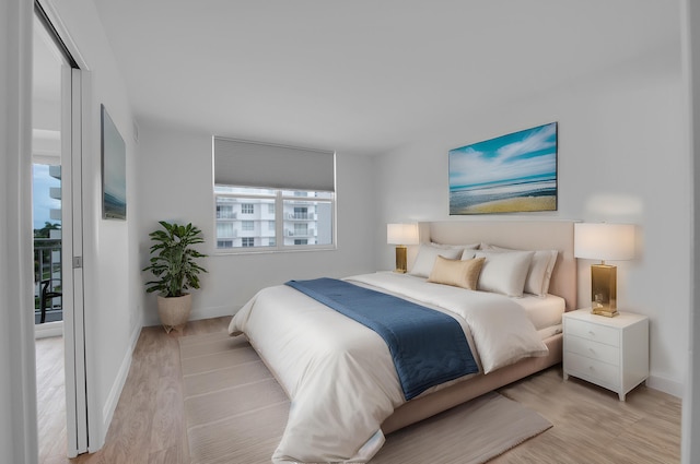 bedroom with light wood-type flooring