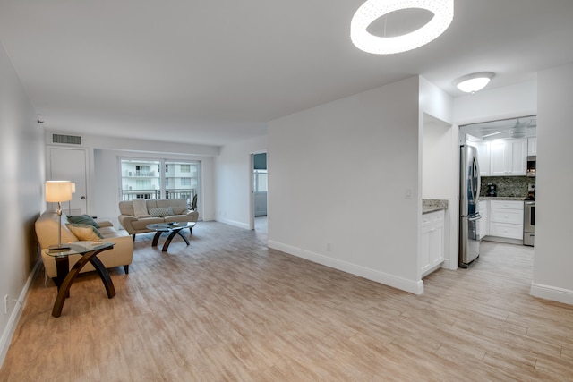 living room featuring light hardwood / wood-style flooring