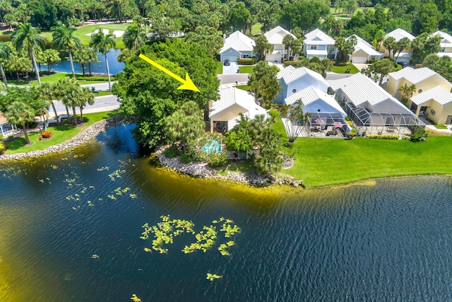 bird's eye view with a water view