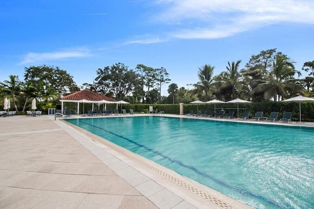 view of swimming pool featuring a gazebo