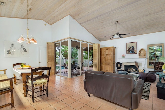 tiled living room with ceiling fan with notable chandelier, high vaulted ceiling, and wood ceiling