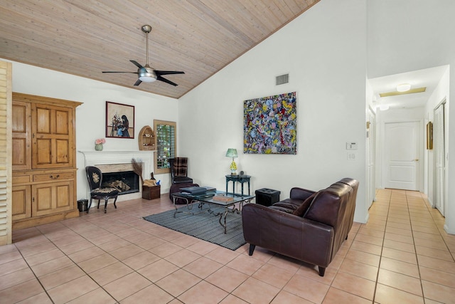 living room featuring high vaulted ceiling, ceiling fan, light tile patterned floors, and wood ceiling