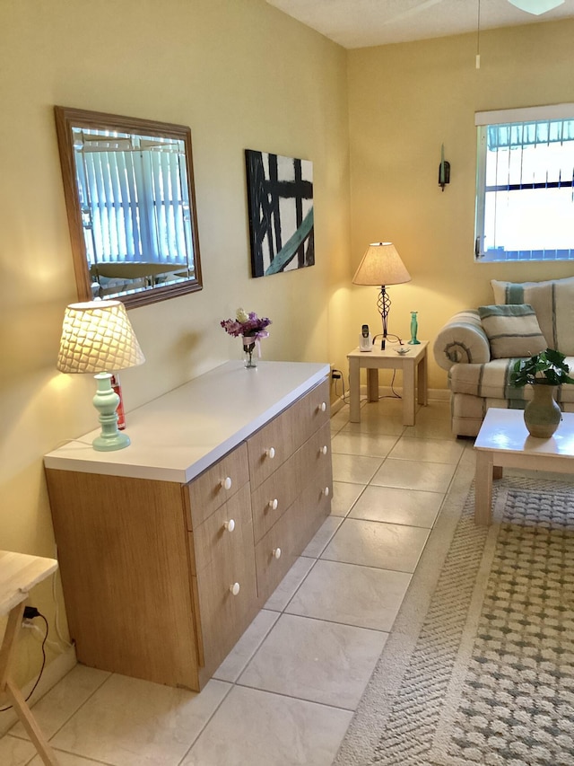 interior space featuring light tile patterned floors