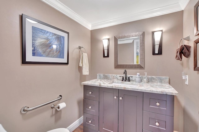 bathroom with vanity and crown molding