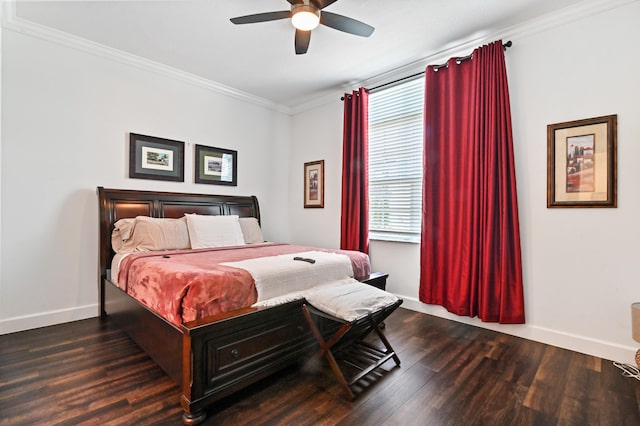 bedroom featuring dark hardwood / wood-style flooring, crown molding, and ceiling fan