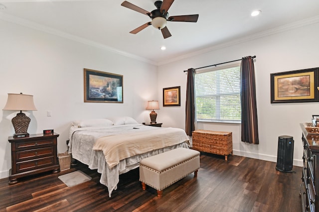 bedroom featuring dark hardwood / wood-style flooring, ornamental molding, and ceiling fan