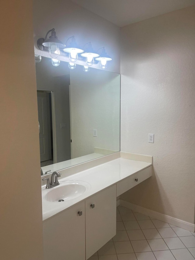 bathroom with vanity and tile patterned flooring