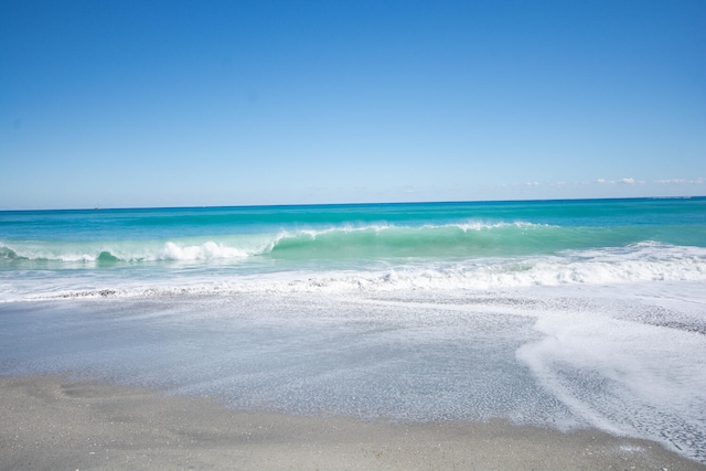 view of water feature featuring a beach view