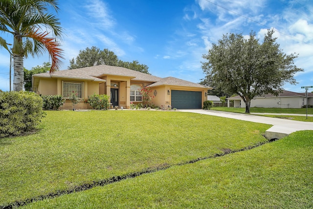 view of front of home featuring a garage and a front lawn