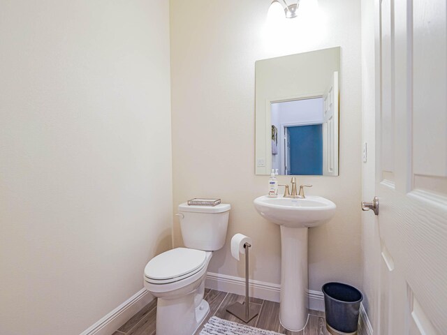 bathroom with sink and toilet