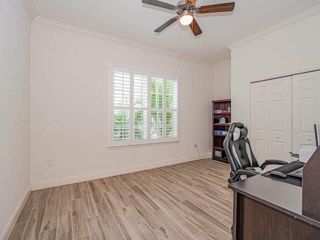 office space with ceiling fan, ornamental molding, and light hardwood / wood-style floors