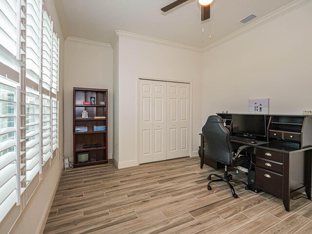 office area with ceiling fan, ornamental molding, and plenty of natural light