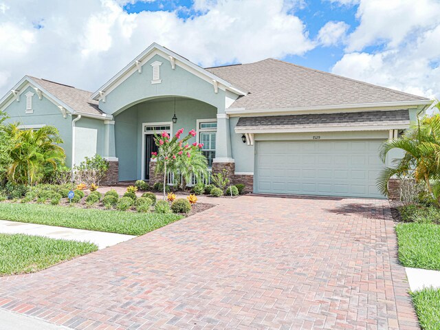 view of front of home featuring a garage