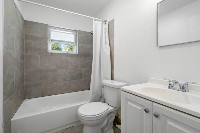 full bathroom featuring toilet, vanity, and shower / tub combo with curtain