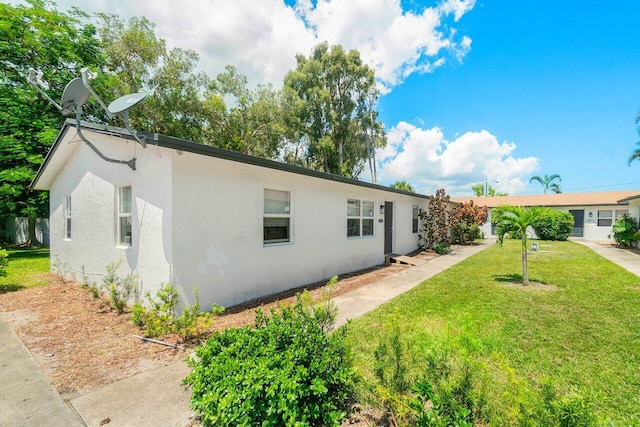 exterior space with a lawn