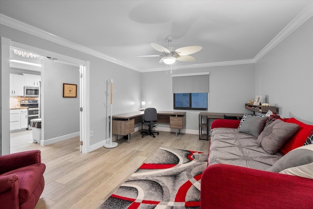 living area featuring light wood-style floors, a ceiling fan, baseboards, and crown molding