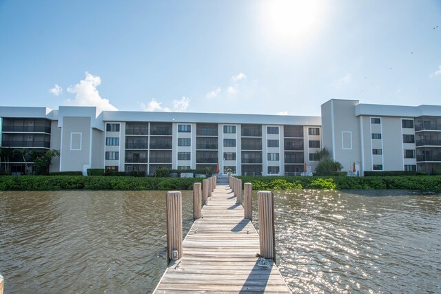 view of dock with a water view