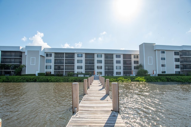 dock area with a water view