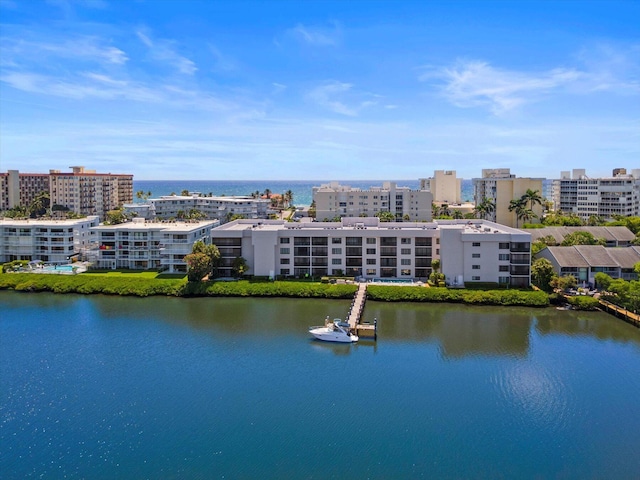 bird's eye view with a view of city and a water view