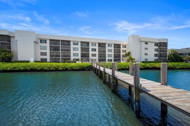 view of dock with a water view