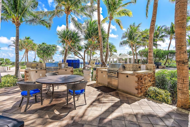 view of patio featuring grilling area and exterior kitchen