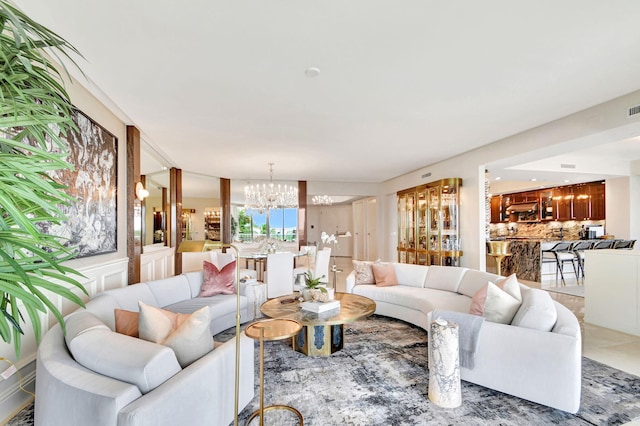 living room with a notable chandelier